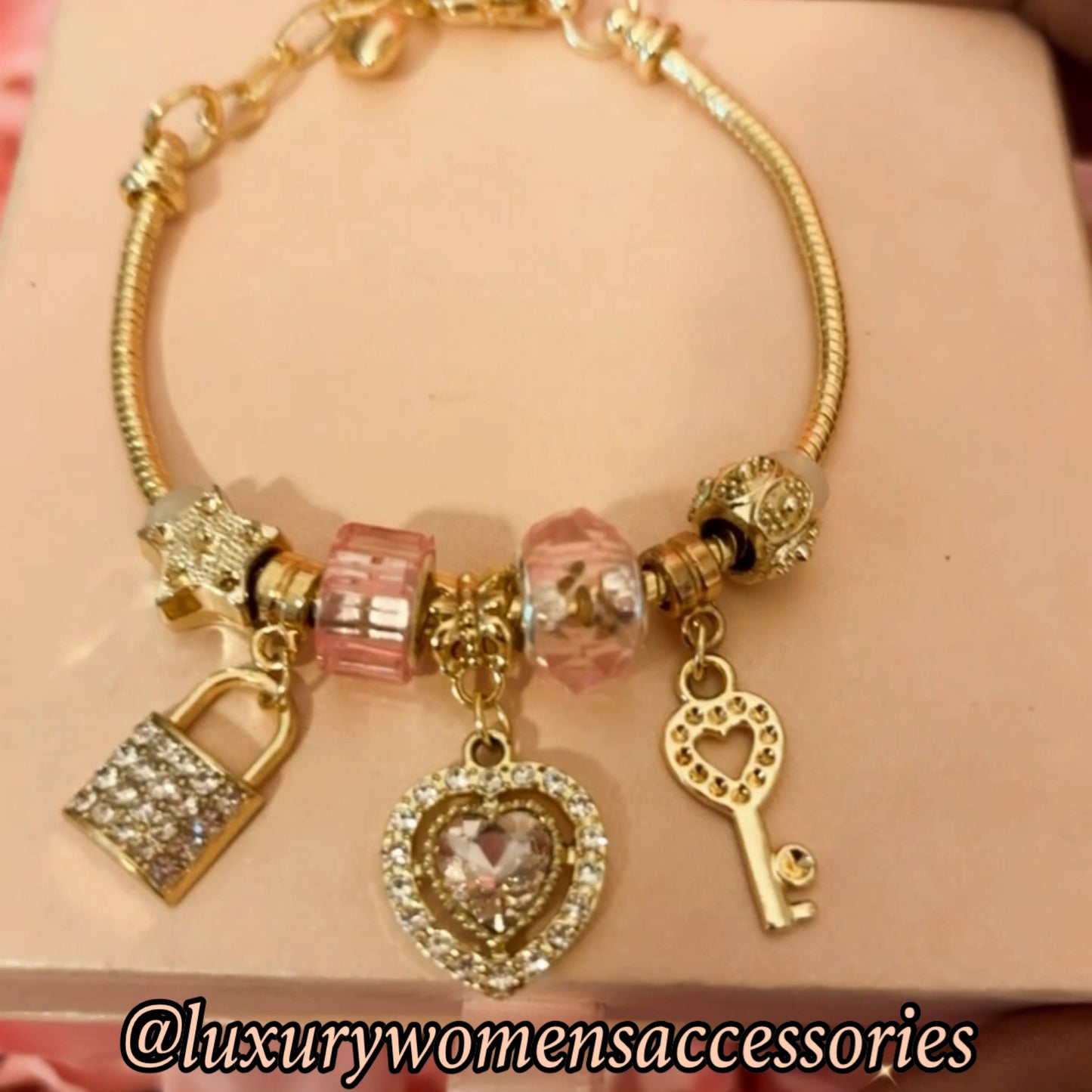 Gold “Heart” Multi Charm Bracelet